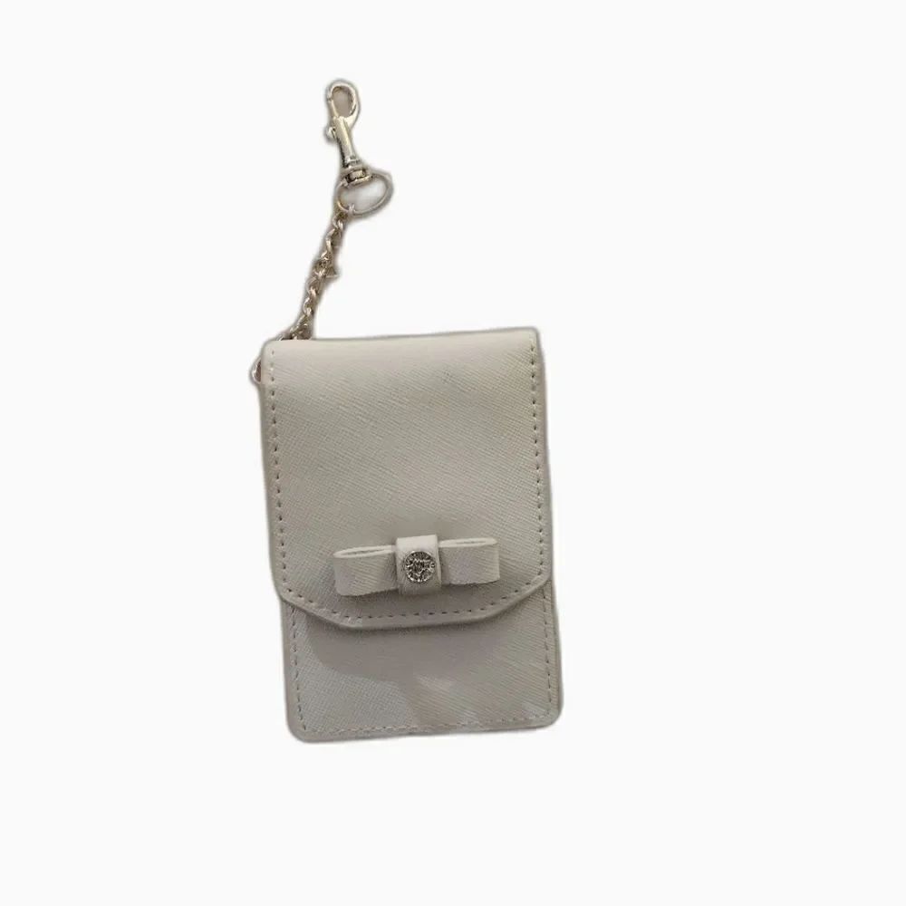 Anne Klein cream wallet keychain